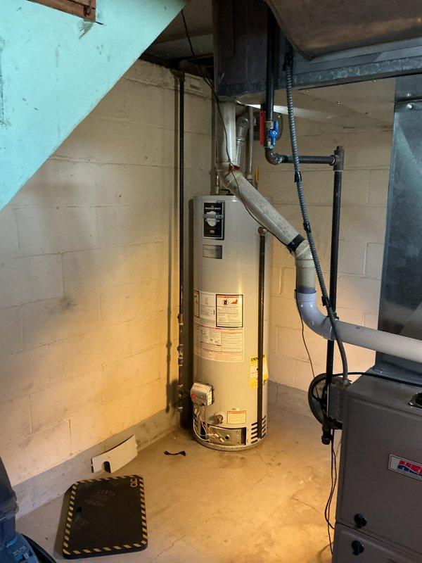 Responded to service call for 10-year-old Bradford White Defender water heater displaying error code of four flashes followed by five flashes, indicating a sensor fault with no hot water production. Upon inspection, diagnosed faulty temperature sensor causing system shutdown. Completed necessary repairs to restore hot water functionality to the unit.