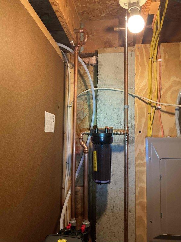 Responded to plumbing leak caused by water line damage that occurred during water softener installation. Upon inspection, located compromised copper water line in basement area near the water treatment system. Repaired the damaged section of the supply line, ensuring proper connection integrity and restoring full water flow to the system. Verified all connections were secure with no active leaks present. System tested and confirmed operational.