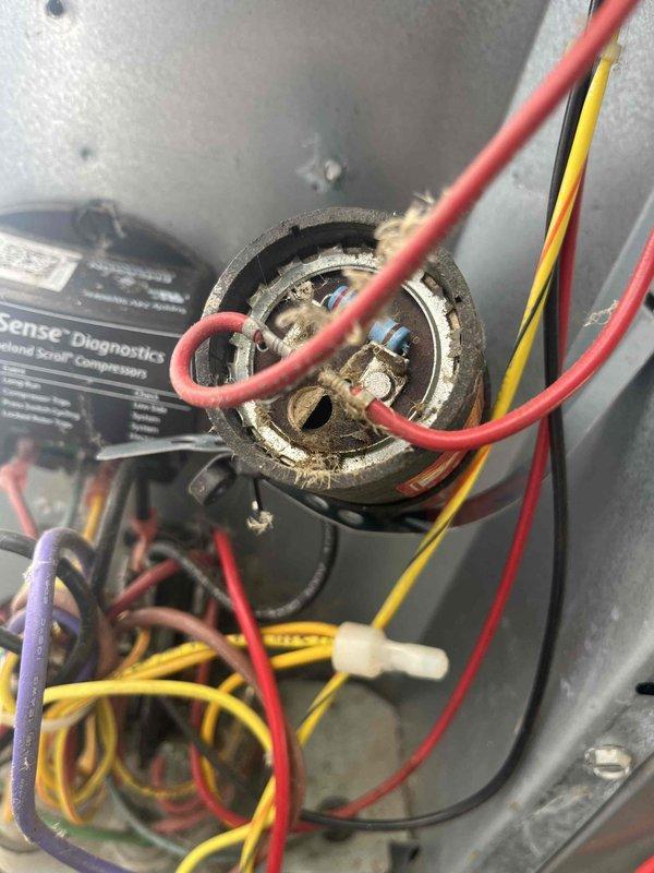 Completed annual cooling maintenance on 2018 EnergiAir system under warranty coverage through September 2026. Performed comprehensive tune-up including electrical diagnostics with amp draw readings at 6.719A, inspected and tested 440V dual-run capacitor showing proper specifications, verified all wire connections at compressor and control board, and documented equipment condition with photos. All components operating within normal parameters; system ready for cooling season.