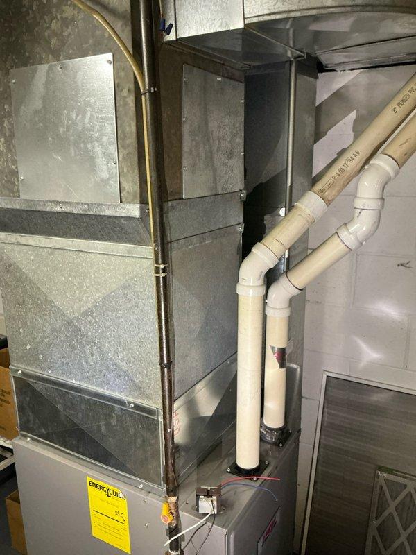 Completed estimate for air conditioning system at residential property. Inspected existing HVAC installation including furnace unit with condensate drainage and venting systems, evaluated electrical service panel with existing A/C circuit breaker configuration, and documented equipment conditions through photography. Provided customer with comprehensive assessment and replacement options for cooling system upgrade.