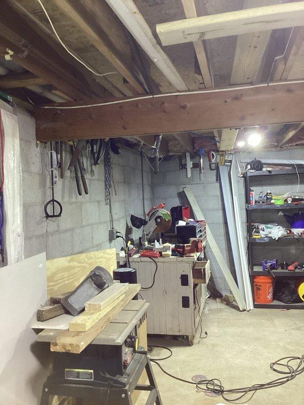 Conducted on-site assessment for new gas line installation in a 20-year-old residential property. Evaluated basement utility area and mechanical room to determine optimal routing for gas line extension. Documented existing HVAC ductwork, plumbing infrastructure including PVC and steel piping configurations, and structural elements such as exposed ceiling joists and concrete block walls. Assessed clearances, spacing requirements, and potential penetration points for code-compliant gas line installation. Photographed current conditions of utility spaces including workshop area to provide comprehensive documentation for project estimate and material requirements.