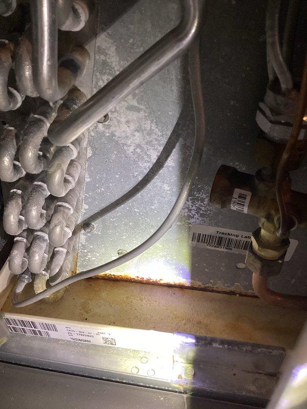 # ASTU-AC Super Tune-Up Completed

Performed comprehensive annual maintenance on a 4-year-old Lennox CX35-36B-6F-20 air conditioning system. Inspected evaporator coil assembly, condensate drain pan, and refrigerant lines; documented system conditions including moisture accumulation in drain pan and minor rust staining on pan edges. Verified all manufacturer specifications, cleaned accessible components, and confirmed proper operation of the cooling system.
