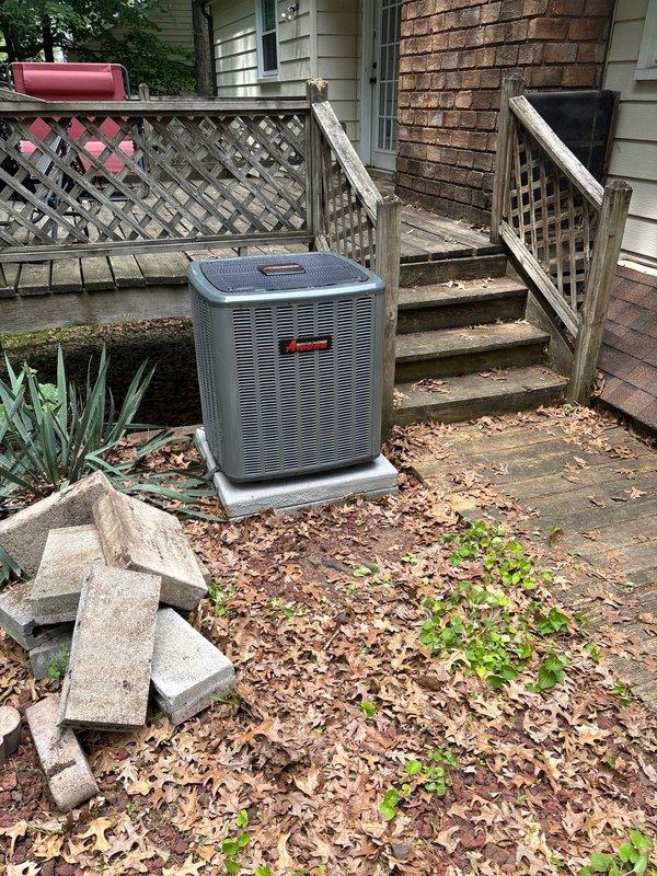 Completed full HVAC system installation including new furnace and air conditioning condenser unit. Interior furnace installed in basement on platform base with proper PVC venting routed upward, connected to ductwork with reflective insulation, and integrated with air handler component. Exterior condenser unit positioned on concrete pad at side of residence with proper clearances maintained, all electrical connections completed, and system tested for proper operation.