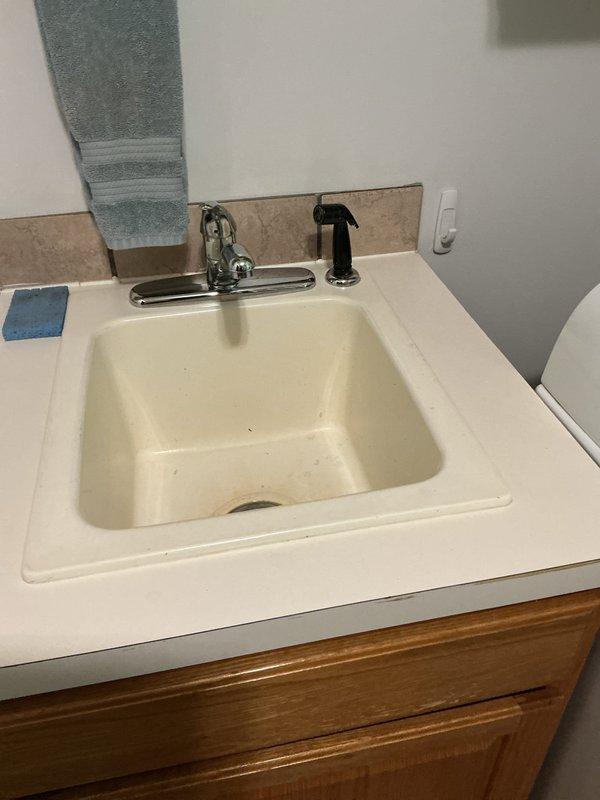 Responded to service call for three leaking faucets in residential bathrooms. Inspected chrome faucets in two separate bathroom vanity areas and identified worn internal components causing the leaks. Replaced deteriorated washers, O-rings, and cartridges as needed on all three fixtures. Tested each faucet for proper operation and verified all leaks were eliminated. Left all fixtures in proper working condition with no active drips or water waste.