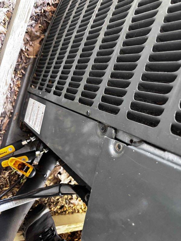 Completed annual cooling system tune-up on 18-year-old Goodman outdoor condensing unit. Performed standard maintenance inspection with gauges to verify refrigerant pressures and system operation, cleared accumulated leaves and debris from around unit base and exterior surfaces, and confirmed equipment is functioning properly for the cooling season.