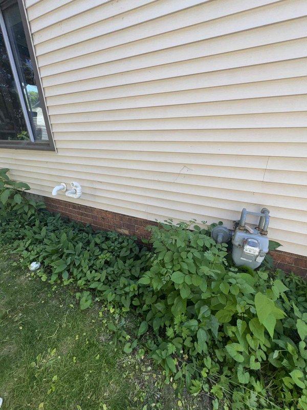 Conducted on-site estimate for Quilt mini-split system installation in converted attic workspace with sloped ceilings, skylight, and home office setup. Assessed exterior wall penetration requirements and evaluated existing utility infrastructure including electrical service location for proper system placement and installation planning.
