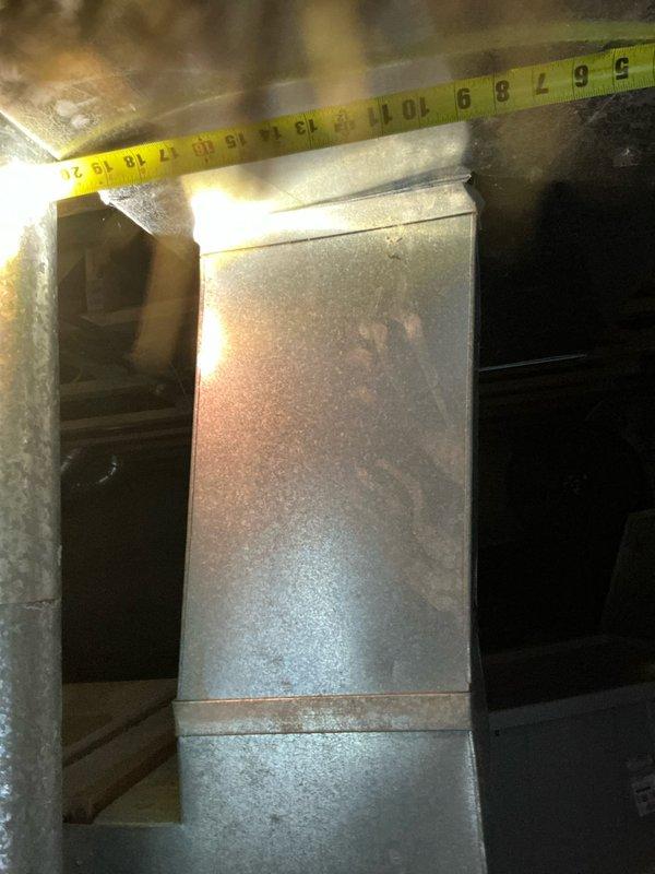 Completed estimate for replacement of existing 1997 HVAC system including furnace and air conditioning unit. System currently operational but has reached end of expected service life at 27+ years old. Documented existing equipment specifications, measured ductwork dimensions, photographed current installation in basement mechanical space including flexible duct connections and electrical service. Assessed structural support requirements and clearances for new equipment installation. Provided customer with replacement options and specifications for updated high-efficiency heating and cooling system.