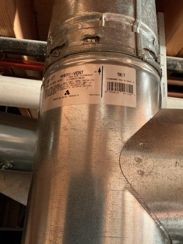 Completed annual cooling maintenance on 19-year-old Bryant system with condenser model year 2020. Performed standard AC tune-up including system inspection, filter check, refrigerant level verification, and electrical connection testing. Per customer request, removed humidifier from club membership program. Inspected ductwork installation in basement area showing flexible and rigid duct connections with proper sealing at joints. Verified ventilation components including Ameri-Vent piping secured with metal banding in attic space. All copper refrigerant lines and galvanized piping connections inspected for integrity. System operating within normal parameters upon completion.