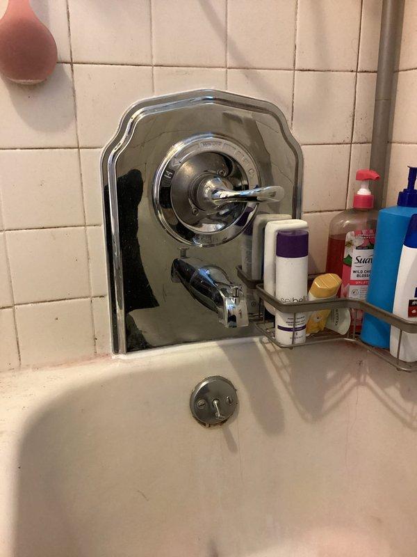 Responded to service call for loose toilet and shower leak. Secured toilet to floor flange by tightening closet bolts and replacing wax ring to ensure proper seal and stability. Inspected shower fixture and tub spout assembly for source of leak. Tightened escutcheon plate connections and tested water flow at shower control valve. Verified all connections at tub spout and drain assembly for proper sealing. Confirmed no active leaks present at toilet base after repairs. All fixtures tested and operating properly upon completion.