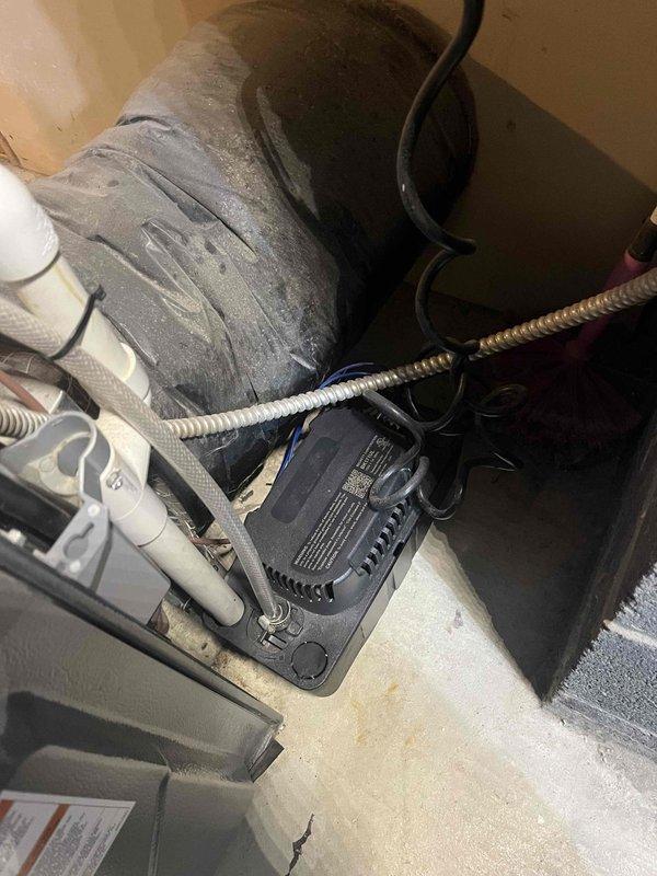 Completed annual cooling maintenance and tune-up on residential air conditioning system. Inspected blower assembly, ductwork connections, electrical components, and refrigerant lines; verified proper operation of all system components. System found in working order with normal wear consistent with age; no immediate repairs required at this time.