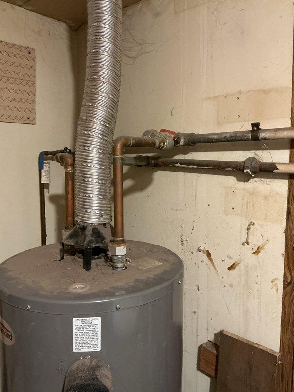 Responded to service call for water heater with pilot light that would not remain lit. Upon arrival, inspected Richmond brand water heater estimated to be over 10 years old. Diagnosed faulty thermocouple as the cause of pilot outage. Replaced thermocouple, tested pilot light operation, and verified proper ignition and flame retention. Unit restored to normal operation with pilot light remaining lit and burner cycling properly.