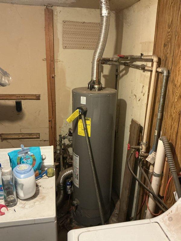Responded to service call for water heater with pilot light that would not remain lit. Upon arrival, inspected Richmond brand water heater estimated to be over 10 years old. Diagnosed faulty thermocouple as the cause of pilot outage. Replaced thermocouple, tested pilot light operation, and verified proper ignition and flame retention. Unit restored to normal operation with pilot light remaining lit and burner cycling properly.