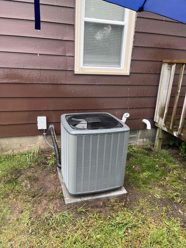 Completed full HVAC system installation including new furnace and air conditioning condenser unit. Installed outdoor AC unit on concrete pad with proper leveling, connected refrigerant lines and electrical service including disconnect box mounted to exterior wall. Routed conduit and wiring per code requirements, established all electrical connections, and verified proper operation of complete heating and cooling system.