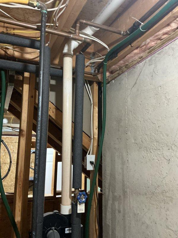 Provided estimate for water heater replacement in basement utility area. Inspected existing plumbing infrastructure including PVC drain lines, supply piping, and electrical routing to determine installation requirements. Additionally reviewed flexible gas piping connection to furnace per client request and provided estimate for replacement and code compliance upgrade of gas line installation.