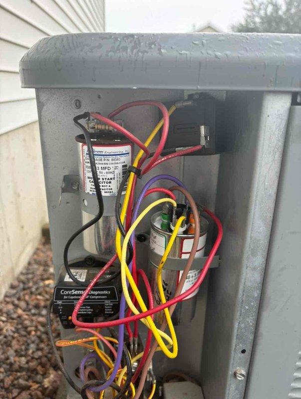 # ASTU-AC Super Tune-up Completed

Performed comprehensive AC super tune-up on 10-year-old EnergiAir outdoor condensing unit. Conducted electrical system inspection, verified capacitor operation and connections, tested contactor functionality, and documented all internal components. Unit operating within normal parameters with all electrical connections secure and capacitors functioning properly.