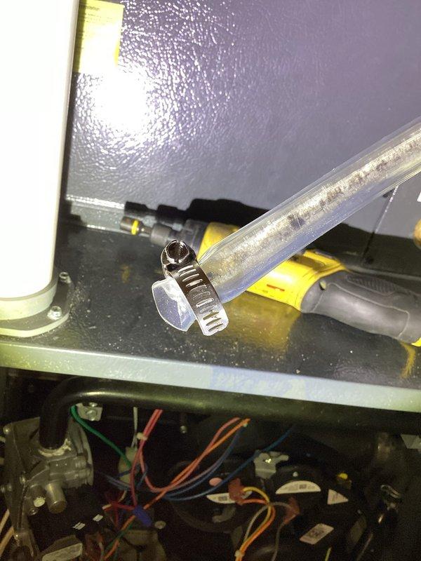 Completed annual cooling maintenance on 11-year-old system. Inspected and serviced condensate drain line with proper airflow direction verification, checked electrical connections and wiring throughout unit, and evaluated filter assembly with secure clamp fittings. All components operating within normal parameters upon completion of preventative maintenance visit.
