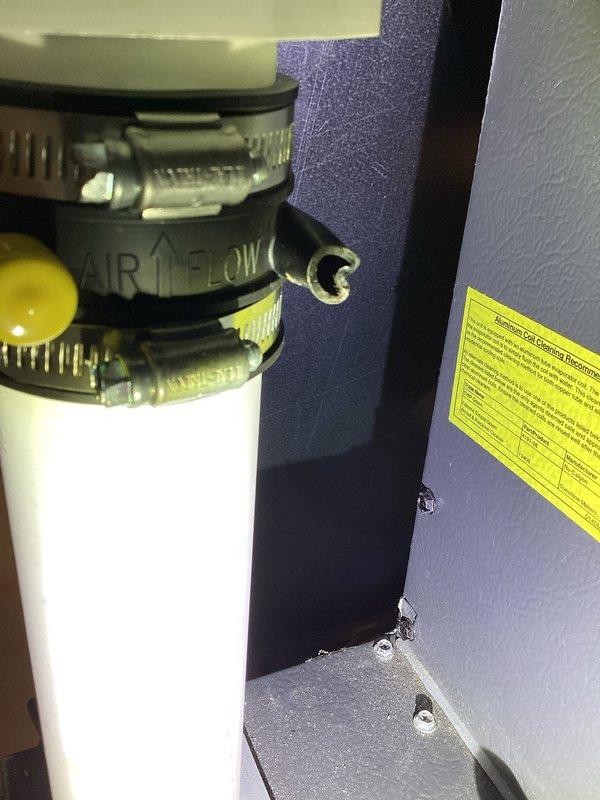 Completed annual cooling maintenance on 11-year-old system. Inspected and serviced condensate drain line with proper airflow direction verification, checked electrical connections and wiring throughout unit, and evaluated filter assembly with secure clamp fittings. All components operating within normal parameters upon completion of preventative maintenance visit.
