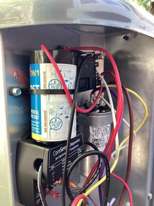 Completed annual cooling maintenance on EnergiAir system under active warranty coverage. Performed comprehensive tune-up including inspection of electrical control panel, dual capacitor, contactors, and all associated wiring connections. All components found operating within normal parameters, system tested and confirmed cooling properly.