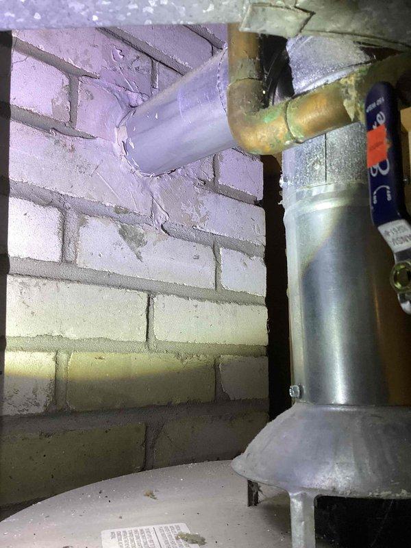 Responded to water heater service call and performed system inspection. Confirmed proper installation of expansion tank and associated copper piping connections. Verified water heater tank condition, pressure relief valve operation, and all plumbing connections for leaks or defects. System found to be functioning within normal parameters with expansion tank properly mounted and secured to prevent thermal expansion issues.
