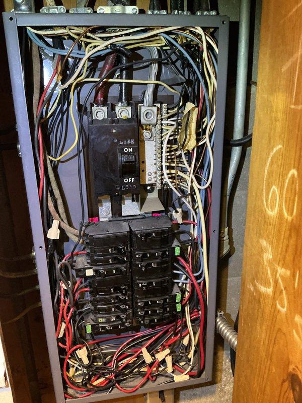 Responded to service call for inoperative whole house fan. Upon arrival, inspected main electrical panel and traced circuit feeding the fan system. Verified proper breaker operation and confirmed power distribution to affected circuit. Documented panel configuration and wiring connections for service records.