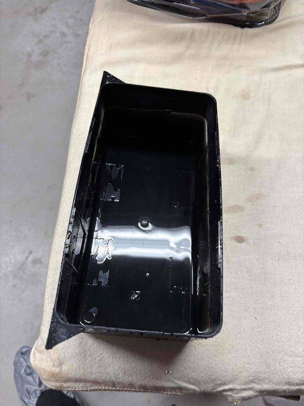 Completed annual cooling maintenance on 11-year-old EnergiAir system with compressor manufactured in 2022. Inspected and cleaned condensate drain pan, which showed accumulated sediment and standing water with debris. Documented drainage system condition with photos showing murky water and particulate buildup in the pan, indicating need for regular monitoring to prevent potential overflow or blockage issues.