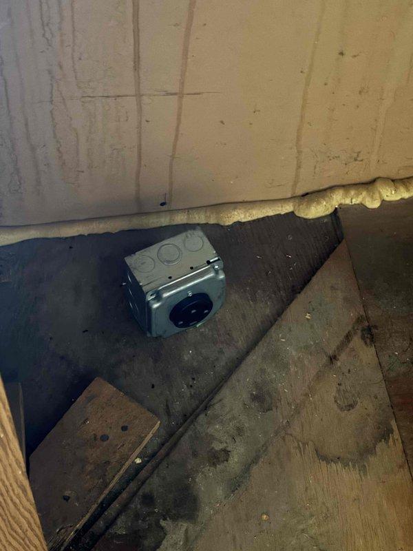 Completed inspector-requested corrections for quoted repair work. Addressed floor opening in kitchen area where hardwood flooring meets stairwell access to basement level, ensuring proper framing and subflooring exposure meets code requirements. Verified and documented foam insulation sealing at basement ceiling/wall junction and confirmed electrical/mechanical component placement on concrete step surface meets inspection standards.