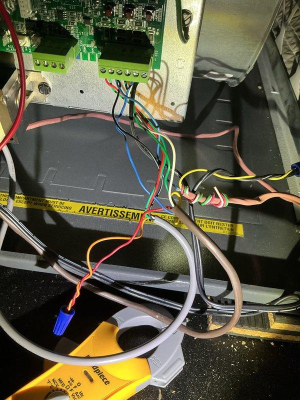 Responded to no cooling call on 2-year-old EnergiAir system. Upon arrival, unit was completely non-responsive. Accessed control board and performed diagnostic testing using digital manifold gauges. Identified control board displaying error code "-5" indicating communication or sensor fault. Inspected all wire connections at terminal blocks, verified proper voltage supply, and checked low-voltage transformer output. Traced wiring harness for potential shorts or loose connections. Control board failure determined to be root cause of system shutdown. Documented existing installation with photos showing circuit board configuration, wire routing, and component layout for warranty processing. System requires control board replacement to restore cooling operation.