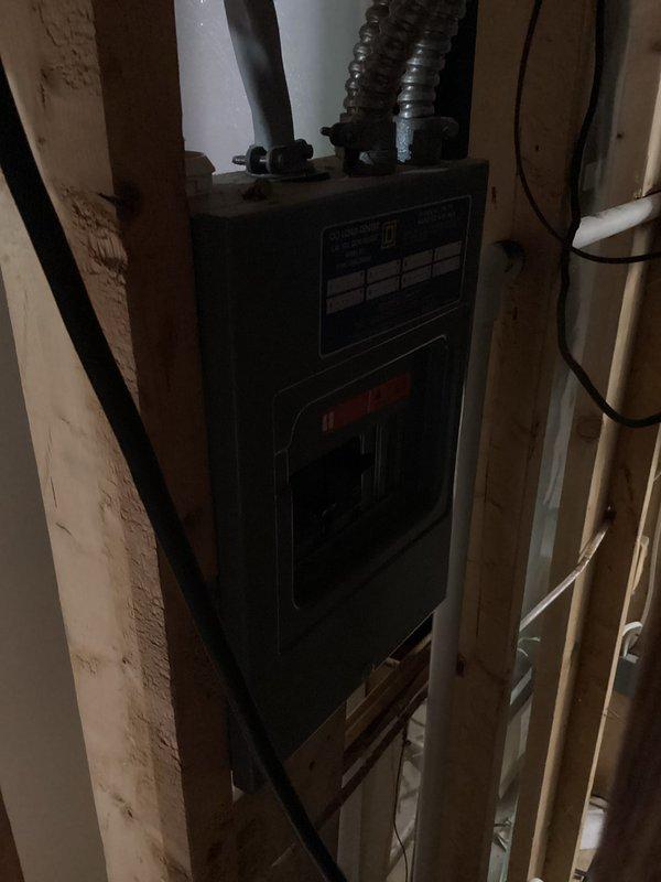 Conducted estimate consultation for replacement of aging 37-year-old BARD geothermal system experiencing inconsistent startup issues while maintaining partial cooling capacity. Evaluated existing electrical service panel and geothermal equipment installation, documented current system configuration with photos of breaker panel and electrical connections. Recommended transitioning from geothermal to conventional forced air gas furnace and air conditioning system as replacement solution.