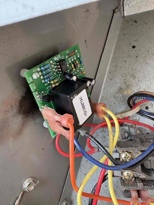 Responded to service call for 23-year-old air conditioning unit not operating. Upon inspection, discovered the control board had suffered catastrophic failure due to severe corrosion and moisture damage. The circuit board exhibited extensive oxidation on copper traces, degraded electronic components, and rust throughout, rendering it completely non-functional. Removed the failed control board from the electrical enclosure and documented the condition. The level of corrosion indicated prolonged exposure to moisture intrusion, which compromised the integrity of the entire board and all connected components. Advised customer that control board replacement would be necessary to restore system operation.