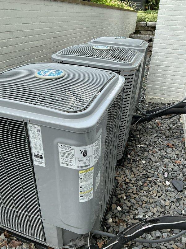 Completed assessment of refrigerant line sets for four air conditioning systems at property. Inspected all exterior condenser units, verified line set routing and mounting along building exterior, and documented current installation conditions with photos. All refrigerant lines and associated PVC pipe covers were examined for proper installation and secure mounting to exterior wall.
