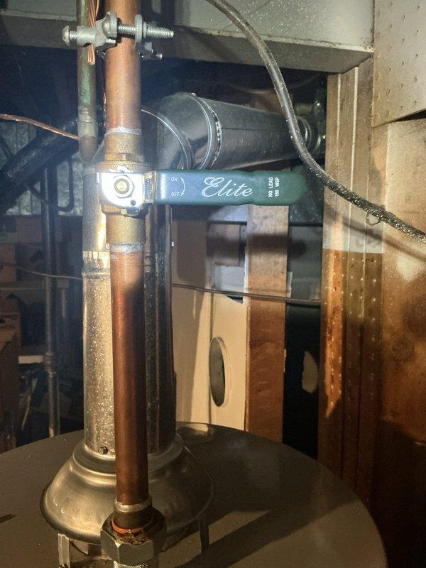 Provided estimate for replacement of existing 6.5-year-old standard water heater with new heat pump water heater unit. Documented current installation including copper supply piping, flue vent assembly, and existing water treatment components. No safety concerns or operational issues reported with current unit at time of assessment.