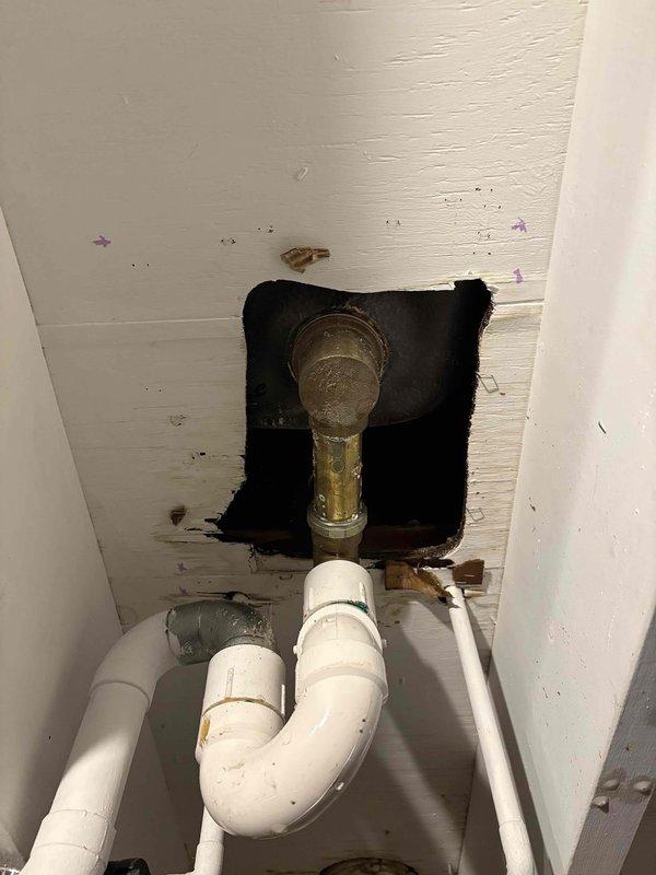 Responded to no hot water complaint on 7-year-old Lochinvar WT 12-2028 boiler system. Upon arrival, found unit in lockout status with flame failure at ignition displayed on control panel. Performed diagnostic assessment and reset procedures per manufacturer specifications. Documented system conditions with photographs showing control panel error codes and related plumbing configuration for service records.
