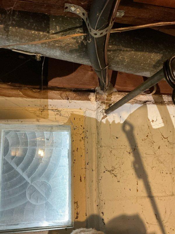 Conducted comprehensive estimate for furnace and air conditioning system replacement in residential property. Existing HVAC equipment is operational but dates to the 1970s, with water accumulation observed near the furnace area indicating potential drainage or condensation issues. Electrical service has been upgraded within the past couple years, which will facilitate modern equipment installation. Assessed ductwork condition showing age-related deterioration and dust buildup, evaluated basement utility area with evidence of moisture concerns on wall surfaces, and documented existing water heater and mechanical room layout for proper equipment sizing and placement recommendations.