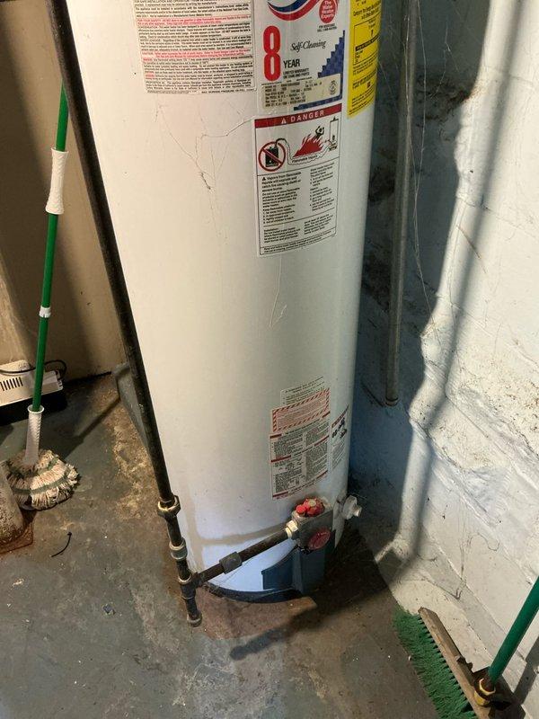 Conducted comprehensive estimate for furnace and air conditioning system replacement in residential property. Existing HVAC equipment is operational but dates to the 1970s, with water accumulation observed near the furnace area indicating potential drainage or condensation issues. Electrical service has been upgraded within the past couple years, which will facilitate modern equipment installation. Assessed ductwork condition showing age-related deterioration and dust buildup, evaluated basement utility area with evidence of moisture concerns on wall surfaces, and documented existing water heater and mechanical room layout for proper equipment sizing and placement recommendations.