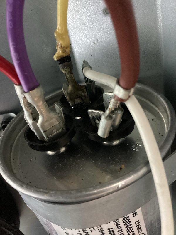 Completed annual cooling maintenance on two AC systems. Performed comprehensive tune-up procedures including inspection of electrical components, capacitor terminals showing age-related corrosion and wire deterioration, and condenser fan assembly. All systems tested and operational upon completion of preventative maintenance service.