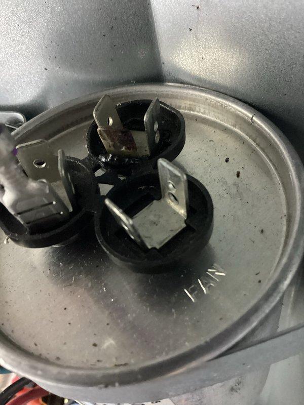 Completed annual cooling maintenance on two AC systems. Performed comprehensive tune-up procedures including inspection of electrical components, capacitor terminals showing age-related corrosion and wire deterioration, and condenser fan assembly. All systems tested and operational upon completion of preventative maintenance service.
