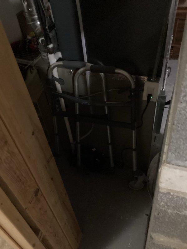 Complete HVAC system replacement performed at residential property. Removed existing air conditioning condenser unit and indoor air handler from basement utility room. Installed new teal-colored outdoor condenser unit on concrete pad with proper electrical disconnect and conduit routing. Replaced indoor air handler in basement mechanical room with new unit, ensuring proper clearances around existing PVC drainage lines and utilities. Evacuated and recharged refrigerant lines using recovery equipment. Verified all electrical connections, tested system operation, and confirmed proper airflow and cooling performance. System commissioned and left in full working order.