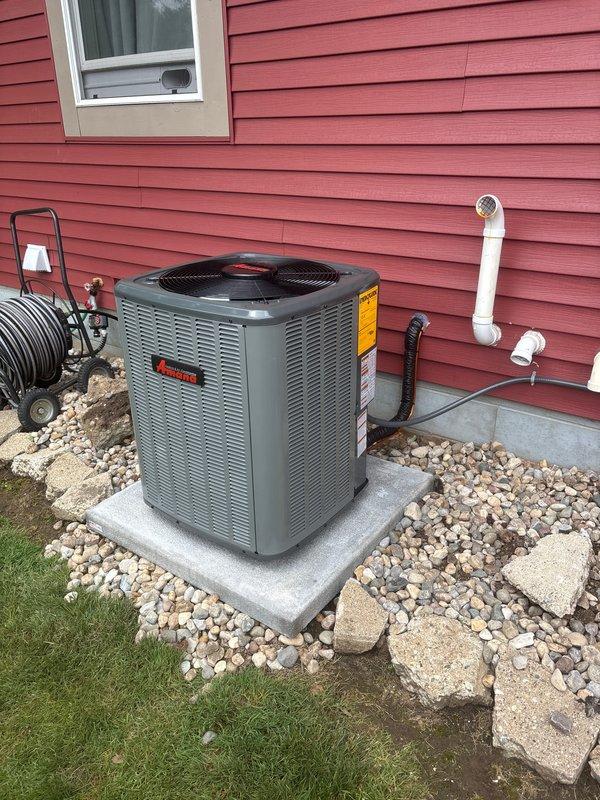 Completed full HVAC system replacement including outdoor Amana condensing unit and indoor air handler. Outdoor unit installed on existing concrete pad with proper clearances, connected refrigerant lines and electrical service, and verified all connections secure. Indoor air handler positioned in mechanical room with new refrigerant piping, condensate drain lines, and electrical connections completed per manufacturer specifications. System startup performed, refrigerant charge verified, and all safety controls tested and operational.