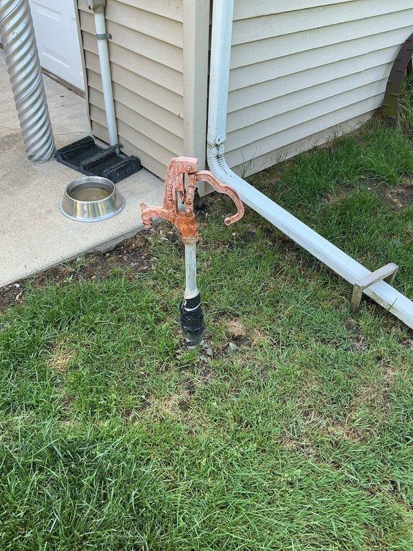Completed yard hydrant replacement at residential property. Removed existing corroded copper yard hydrant assembly showing significant rust and deterioration at connection points and fittings. Installed new frost-free yard hydrant with proper drainage to prevent freezing during winter months. Connected new unit to existing water supply line, ensuring secure joints and proper pitch for seasonal drainage. Tested system for leaks and verified full operational functionality including water flow and shutoff capabilities. No water damage or active leaking was present prior to replacement work.