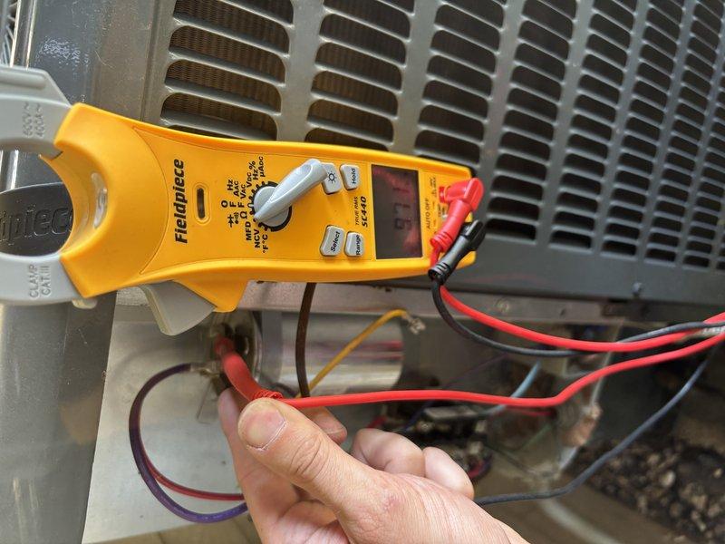 Responded to callback for insufficient cooling following recent repair. Performed diagnostic testing of HVAC system electrical components using clamp meter to verify proper amperage draw and system operation. Measured supply air temperature and compared against thermostat setpoint of 70°F to assess system performance. Verified all electrical connections, tested compressor and blower motor operation, and confirmed system is now cooling adequately to maintain desired temperature. System operating within normal parameters.