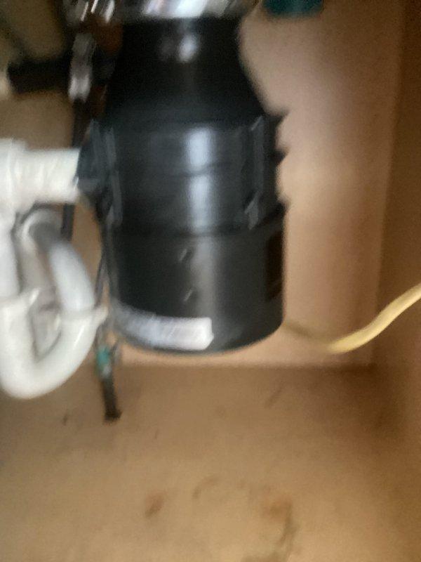 Returned to property for follow-up inspection of recently installed garbage disposal unit. Verified proper installation and secure mounting of disposal within cabinet enclosure. Confirmed all plumbing connections, including waste line and P-trap assembly, were leak-free and functioning correctly. Tested disposal operation and drainage performance. Unit operating as intended with no issues observed. Installation complete with customer walkthrough.
