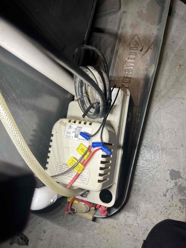 Completed annual cooling system tune-up on EnergiAir unit under active warranty. Performed comprehensive maintenance including inspection of condensate pump assembly, electrical connections, and drainage system components. All wiring connections were verified secure, condensate removal system tested and confirmed operational, and equipment cleaned and returned to proper working condition.