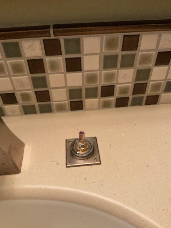 Responded to service call for reported basement leak and water filtration system inquiry. Upon inspection, documented existing plumbing fixtures including kitchen undermount sink with chrome pull-down faucet and related counter-mounted accessories. Assessed current plumbing configuration and photographed installation areas to evaluate filtration system options and identify potential leak sources. Customer seeking single or dual filtration system installation; provided recommendations for appropriate water treatment solutions based on household needs and existing plumbing infrastructure.