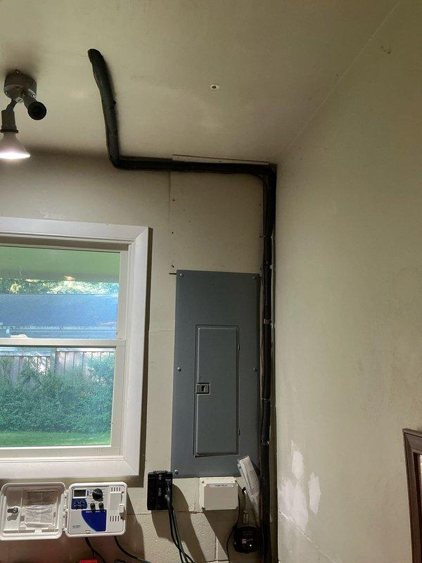 Responded to service call for non-operational air conditioning system with refrigerant leak. Performed comprehensive system evaluation of both indoor and outdoor components to assess equipment condition and identify source of refrigeration loss. Documented existing installation including electrical panel access, refrigerant line routing through interior mechanical space, and exterior condenser unit location at building foundation. Photographed current system configuration showing refrigerant piping, electrical connections, and equipment placement for estimate preparation. Provided customer with detailed repair options and replacement recommendations based on system age, leak severity, and cost-effectiveness of repair versus replacement.