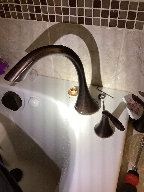Replaced worn Moen cartridge in bathtub faucet to restore proper water flow and temperature control. Disassembled existing faucet handles and spout assembly, removed old cartridge, installed new OEM replacement cartridge, reassembled fixtures, and tested operation to ensure leak-free performance.