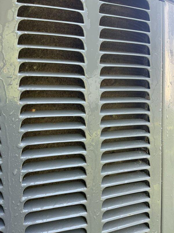 Completed annual heating and cooling maintenance visit on residential HVAC system with active extended warranty coverage through 2026 and 2030. Performed comprehensive furnace tune-up including inspection of gas valve assembly, ignition system, blower motor, electrical connections, and control board; all components found operating within normal parameters. Conducted air conditioning system tune-up with inspection of exterior condenser unit and ventilation components; noted moderate accumulation of dirt and debris on outdoor louvers but airflow remains adequate. All safety controls tested and verified functional, system cycling properly.