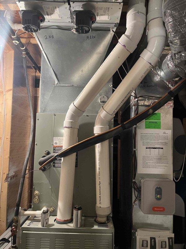 Responded to customer complaint of AC making starting noise with fan failure on 10-year-old system. Upon inspection, diagnosed failed blower motor and capacitor. Replaced defective blower motor assembly and run capacitor, restoring proper airflow and eliminating abnormal starting sounds. Tested system operation through complete cooling cycle, verified proper amperage draw, and confirmed normal fan operation at all speeds.