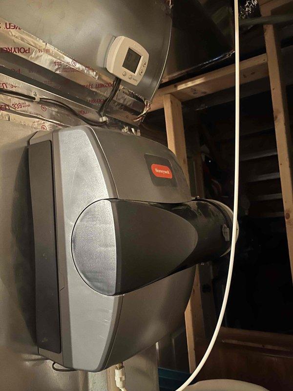 Responded to customer complaint of AC making starting noise with fan failure on 10-year-old system. Upon inspection, diagnosed failed blower motor and capacitor. Replaced defective blower motor assembly and run capacitor, restoring proper airflow and eliminating abnormal starting sounds. Tested system operation through complete cooling cycle, verified proper amperage draw, and confirmed normal fan operation at all speeds.