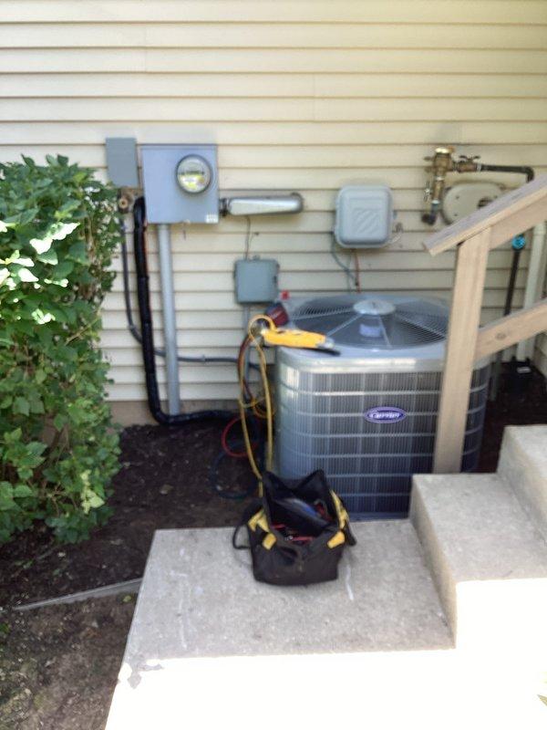 Successfully completed full HVAC system installation including Carrier outdoor condensing unit and indoor air handler. Mounted condensing unit on concrete pad with proper clearances and secured all refrigerant line sets with appropriate insulation. Installed electrical disconnect box, junction boxes, and completed all electrical connections per manufacturer specifications and local code requirements. Routed copper refrigerant lines along exterior wall with proper support brackets and connected to both indoor and outdoor units. Installed shutoff valves and service ports for future maintenance access. Completed all gas piping connections as needed. Performed system startup, charged refrigerant to manufacturer specifications, and verified proper operation of all components. Tested electrical connections, airflow, and temperature differential to ensure optimal system performance.