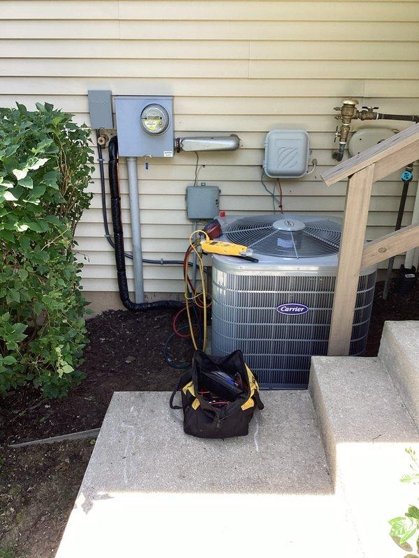 Successfully completed full HVAC system installation including Carrier outdoor condensing unit and indoor air handler. Mounted condensing unit on concrete pad with proper clearances and secured all refrigerant line sets with appropriate insulation. Installed electrical disconnect box, junction boxes, and completed all electrical connections per manufacturer specifications and local code requirements. Routed copper refrigerant lines along exterior wall with proper support brackets and connected to both indoor and outdoor units. Installed shutoff valves and service ports for future maintenance access. Completed all gas piping connections as needed. Performed system startup, charged refrigerant to manufacturer specifications, and verified proper operation of all components. Tested electrical connections, airflow, and temperature differential to ensure optimal system performance.